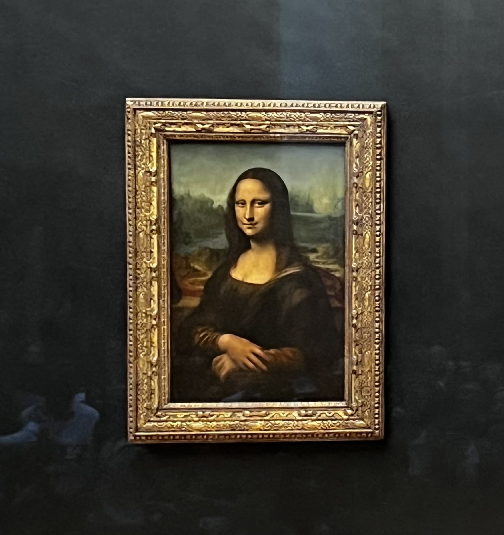 The Mona Lisa on display at the Louvre, Paris